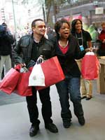 Oprah and Bono go shopping.